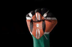 11112292-low-key-picture-of-a-fist-painted-in-colors-of-kenya-flag